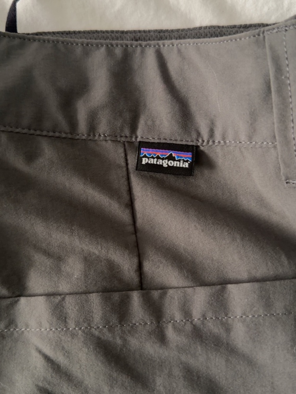 Patagonia gray outdoor shell with logo tab